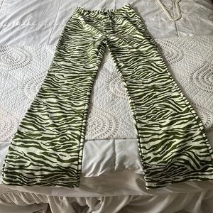 Green zebra flare pants